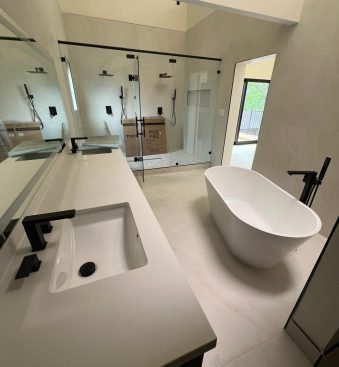 High-quality image of Bathroom-Remodeling-2025-09-04 project in 10101 Fondren Rd, Houston, TX 77096 by HTR Remodeling.